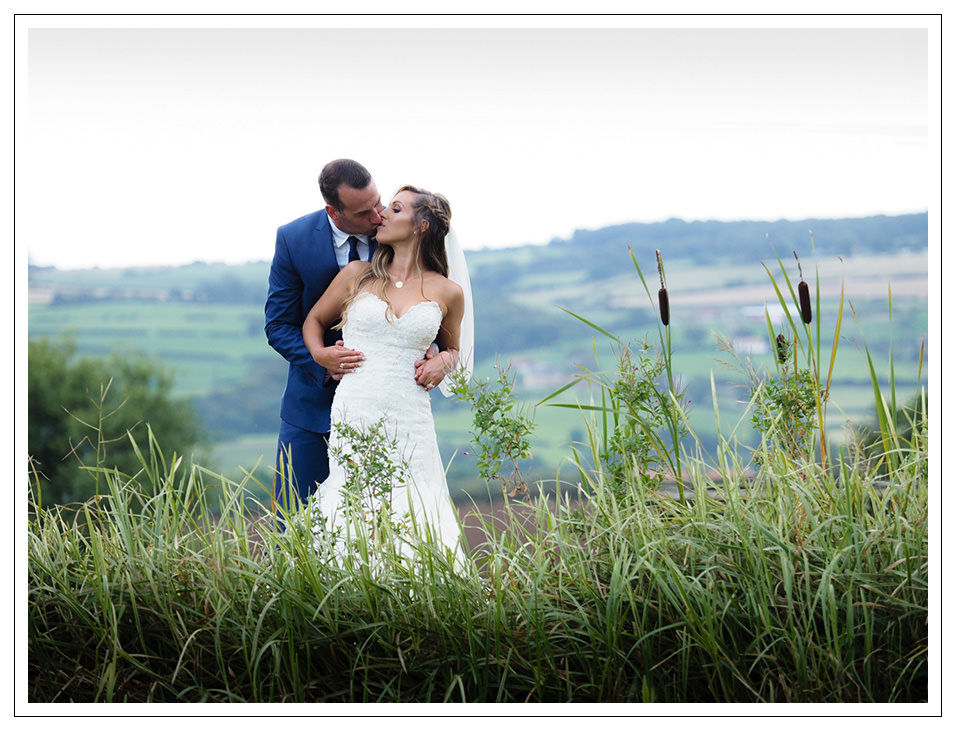 bride and groom portrait at crossbutts stables in whitby