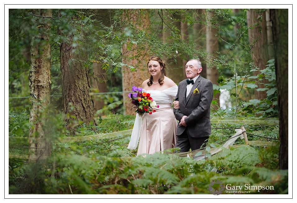 the walk through the woods for bride and her father at camp katur