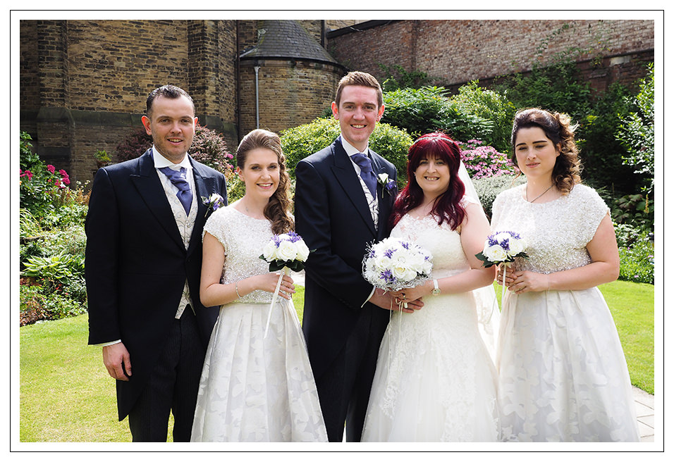 Bridal Party portraits in the garden of St Wilfred's church