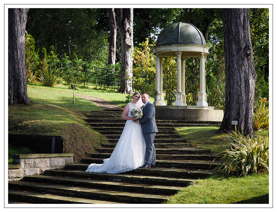 bride and groom portrait in the grounds of rushpool hall