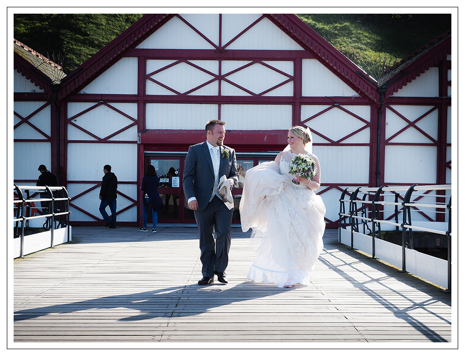 bride and groom on saltburn pier