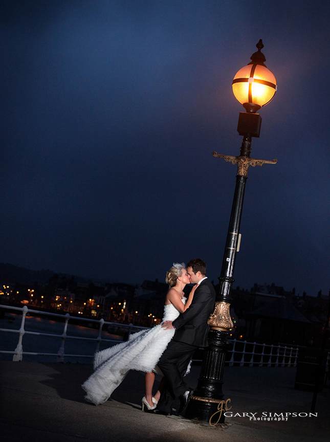 bride and groom on whitby pier
