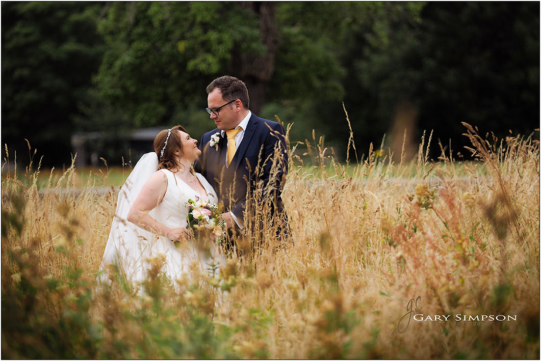 bride and groom in the grounds of the talbot hotel in malton