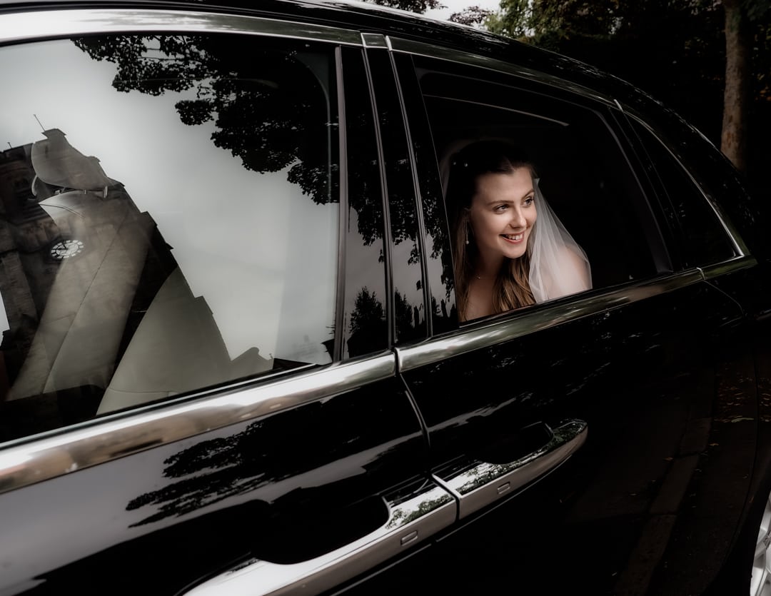 bride arriving at the church for the wedding ceremony in cheshire