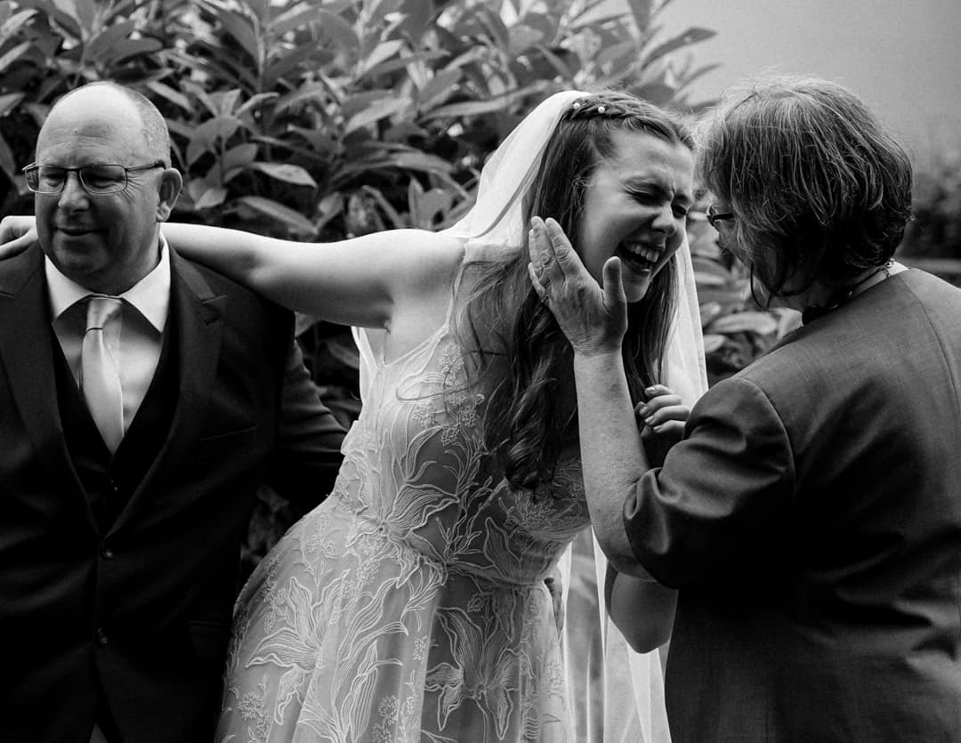 A north yorkshire wedding photographer captures the bride sharing a joke with her grandmother