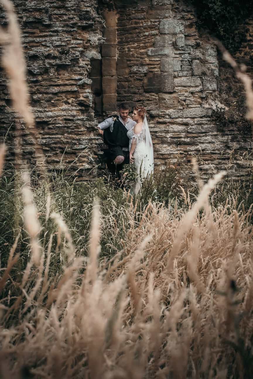 bride and groom in the grounds of sheriff hutton
